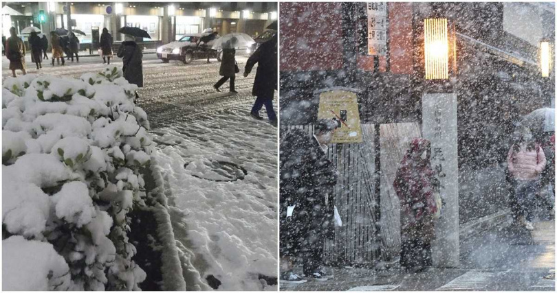 京都行人在大雪中行走。